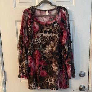 long sleeve Animal print/floral top. Open shoulder. Worn once.